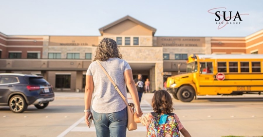 parent and child going to school